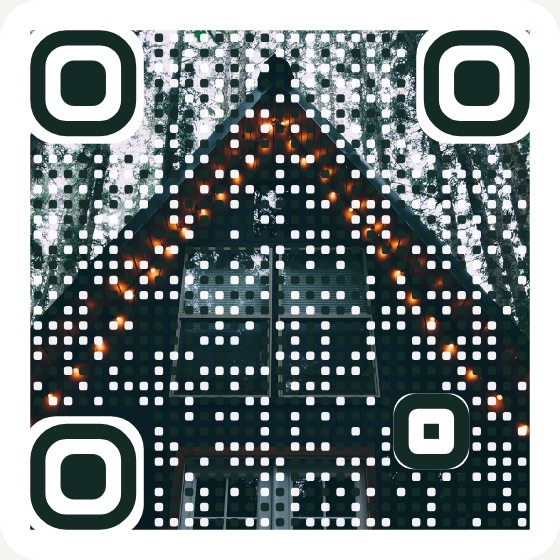 A QR code woven into a photo of an A-frame cabin